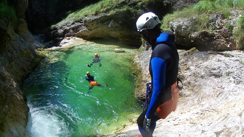 Three canyoneers in the Julian Alps