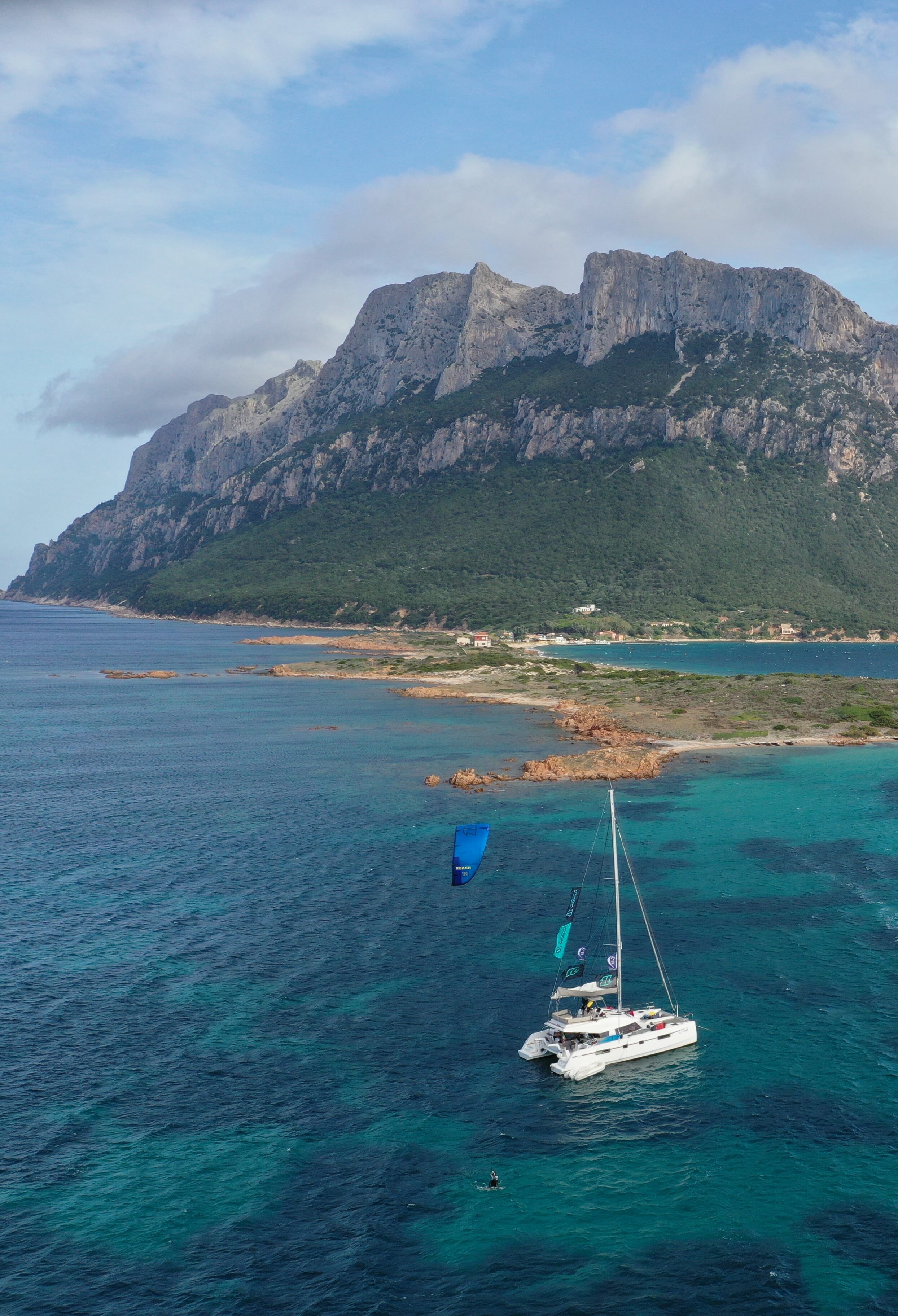 Catamaran sailing off the coast of Sardinia