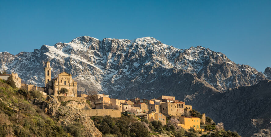 Mountain village of Montemaggiore in the Balagne region of Corsica with Monte Grosso mountain behind