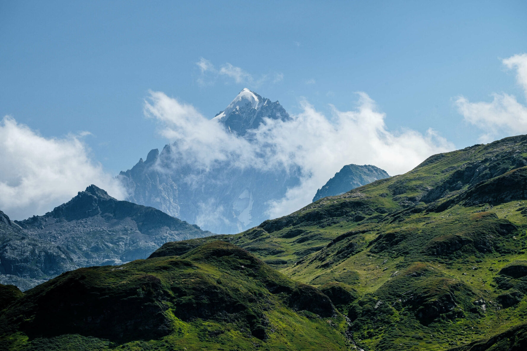 Peak among clouds in Mont Blanc