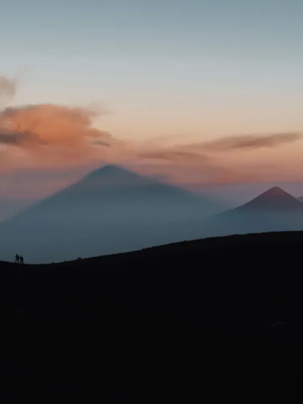 Sunrise seen from Acatenango and a hiker