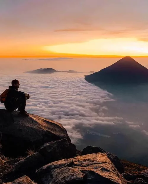 Sunrise seen from Acatenango and a hiker