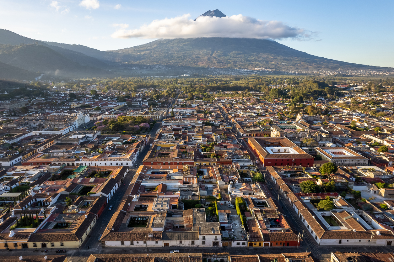City of Antigua from air and volcanoes in the background