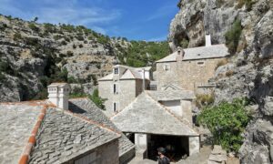 A view of a rider exploring the Blaca monastery on Brač, Croatia.