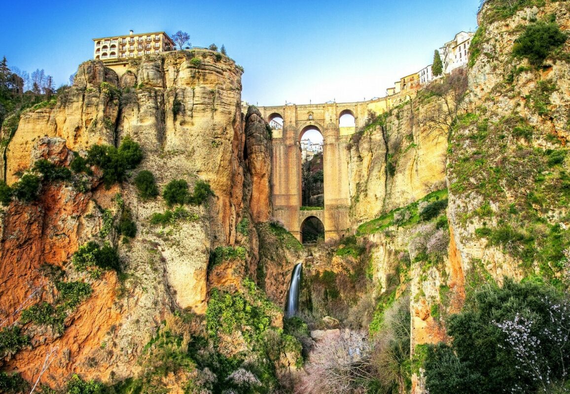 El Tajo gorge with an impressive stone bridge connecting two parts of an Andalusian town.