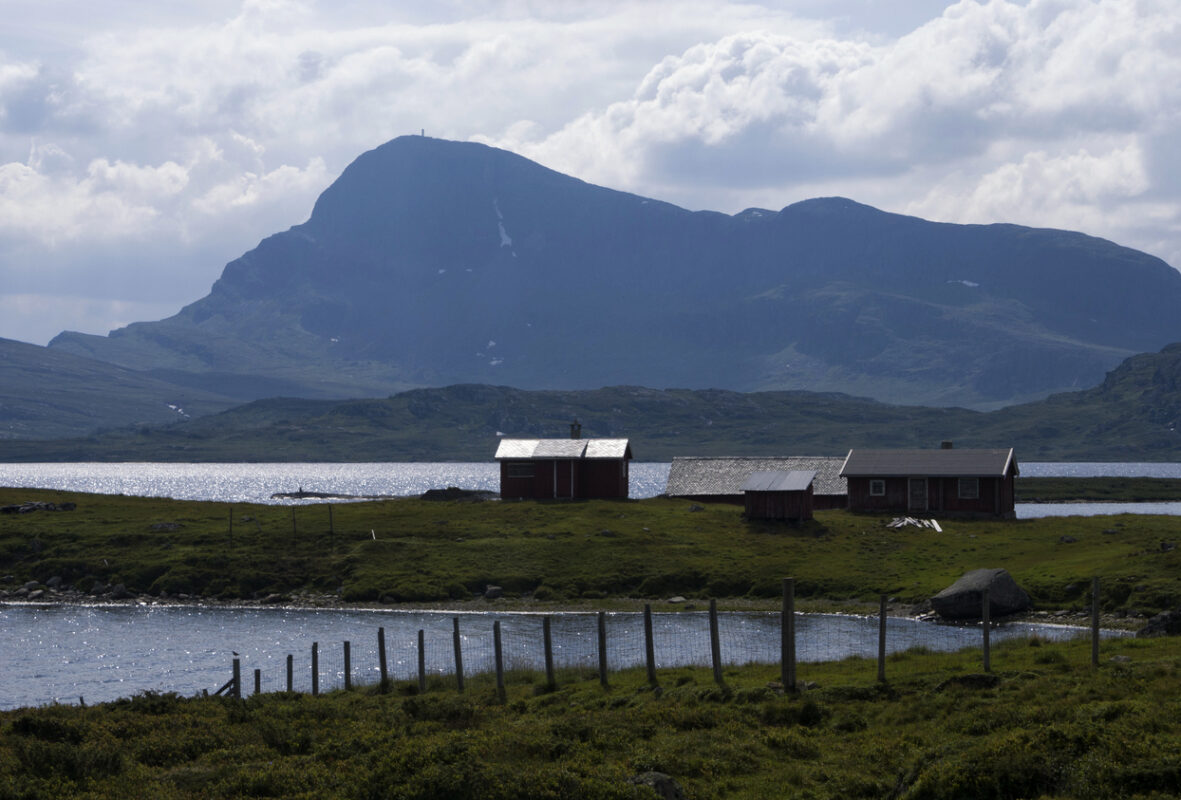 Shimmering lakes in Norway’s Espedalen Valley, surrounded by awe-inspiring peaks.