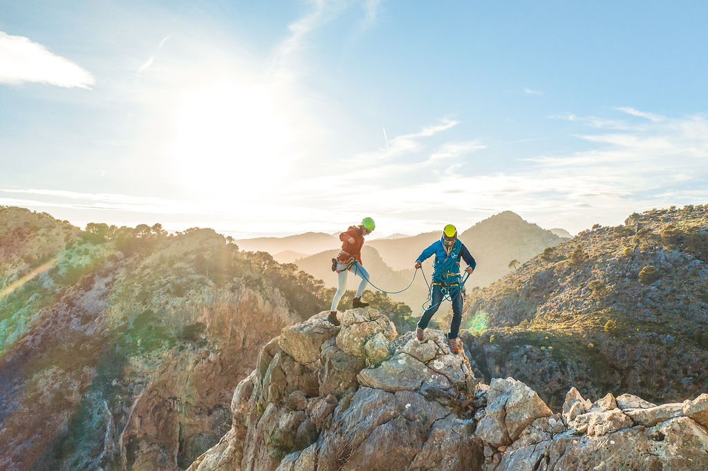 Two climbers finishing a route in the Alicante mountains.