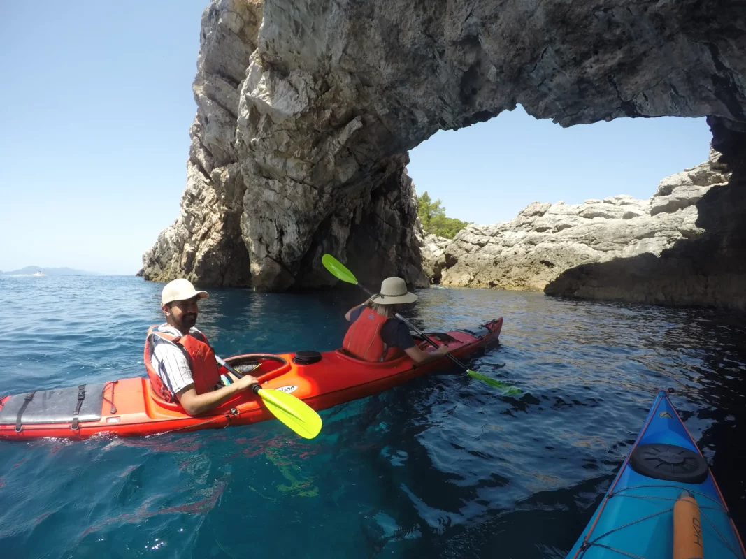 Two friends kayaking on the Adriatic Sea in Dubrovnik
