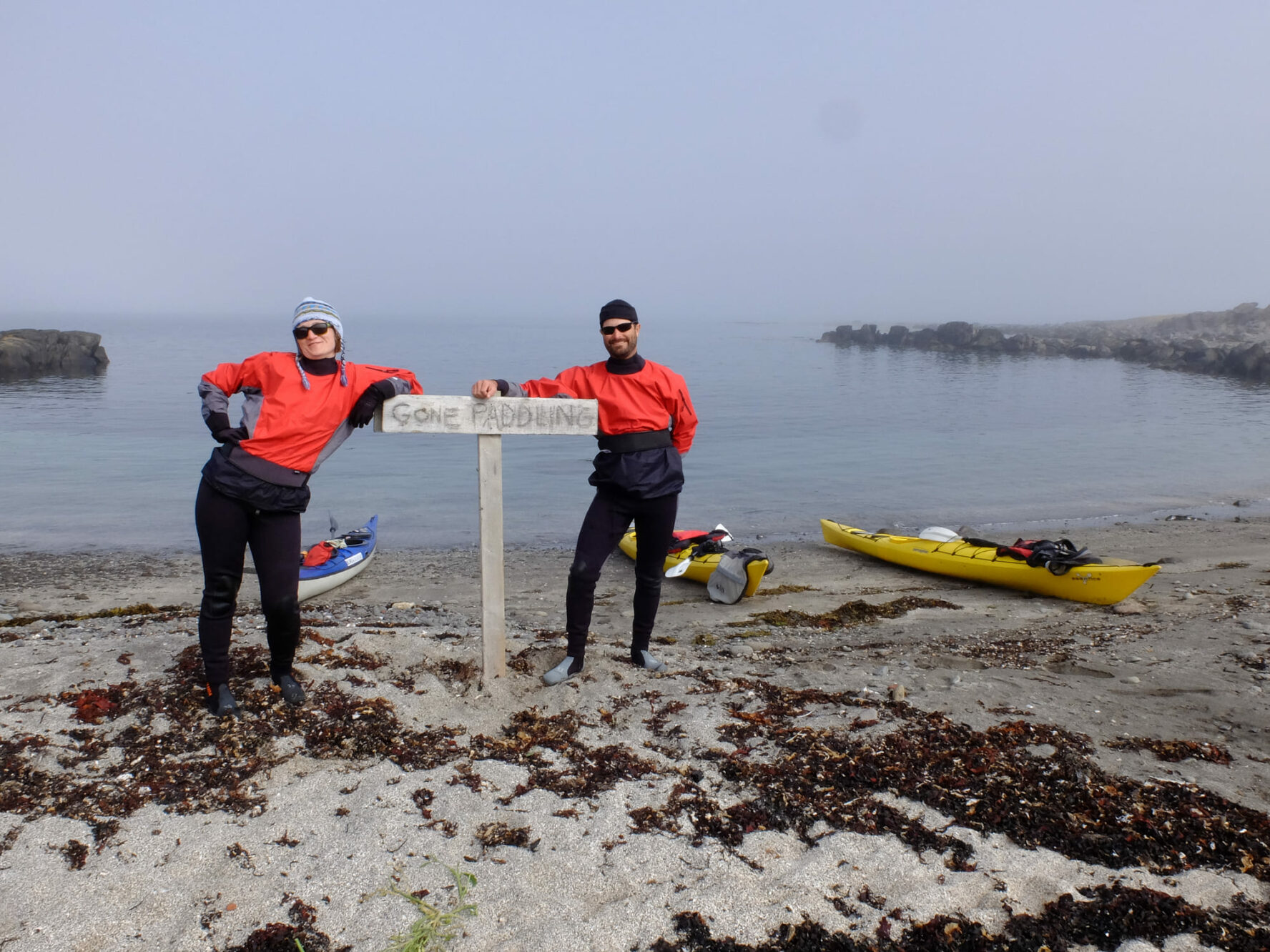 Two people standing in Iceland ashore
