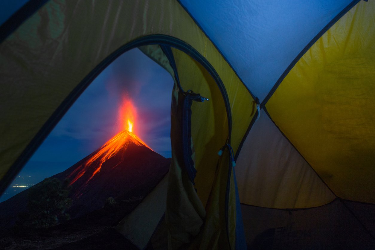 Eruption of Volcan De Fuego as seen from a tent in a camp Acatenango