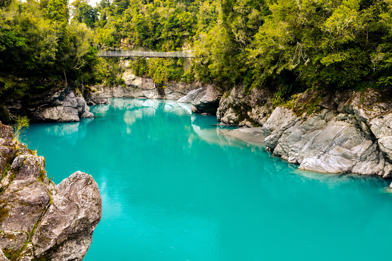 Hokitika Gorge and its dramatic cliffs and turquoise waters, one of the highlights of cycling the West Coast Wilderness Trail.