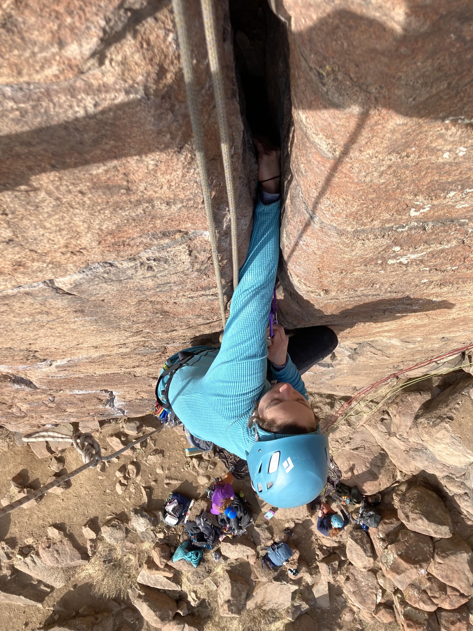 Rock climber climbing in the Flatirons