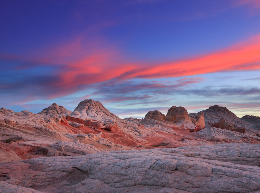 Sandstone formations at White Pocket during sunrise.