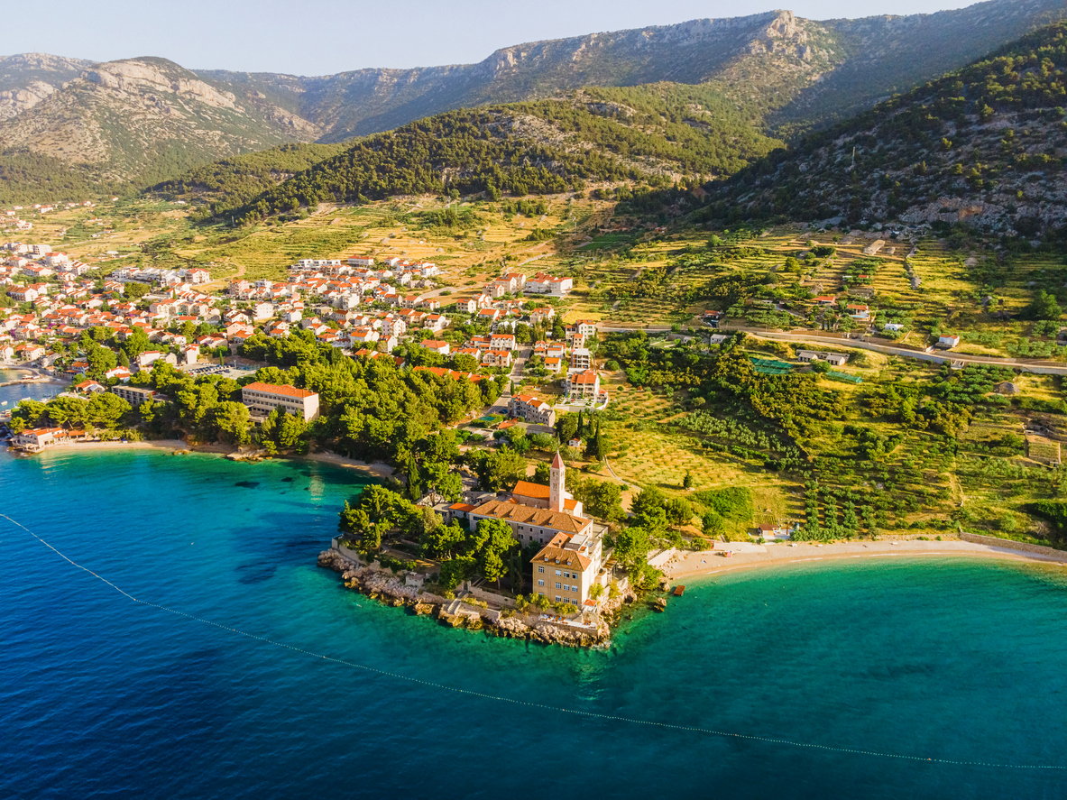 Aerial view of Dominician monastery and Martinica beach on Adriatic sea, Bol, Brac island, Croatia.
