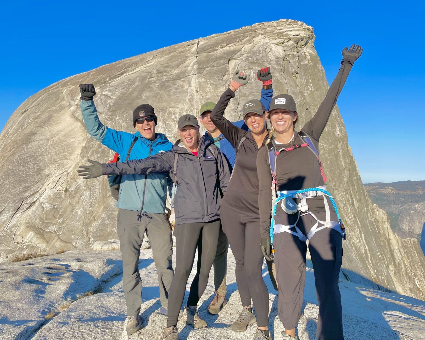 Five hikers on the Half Dome cables