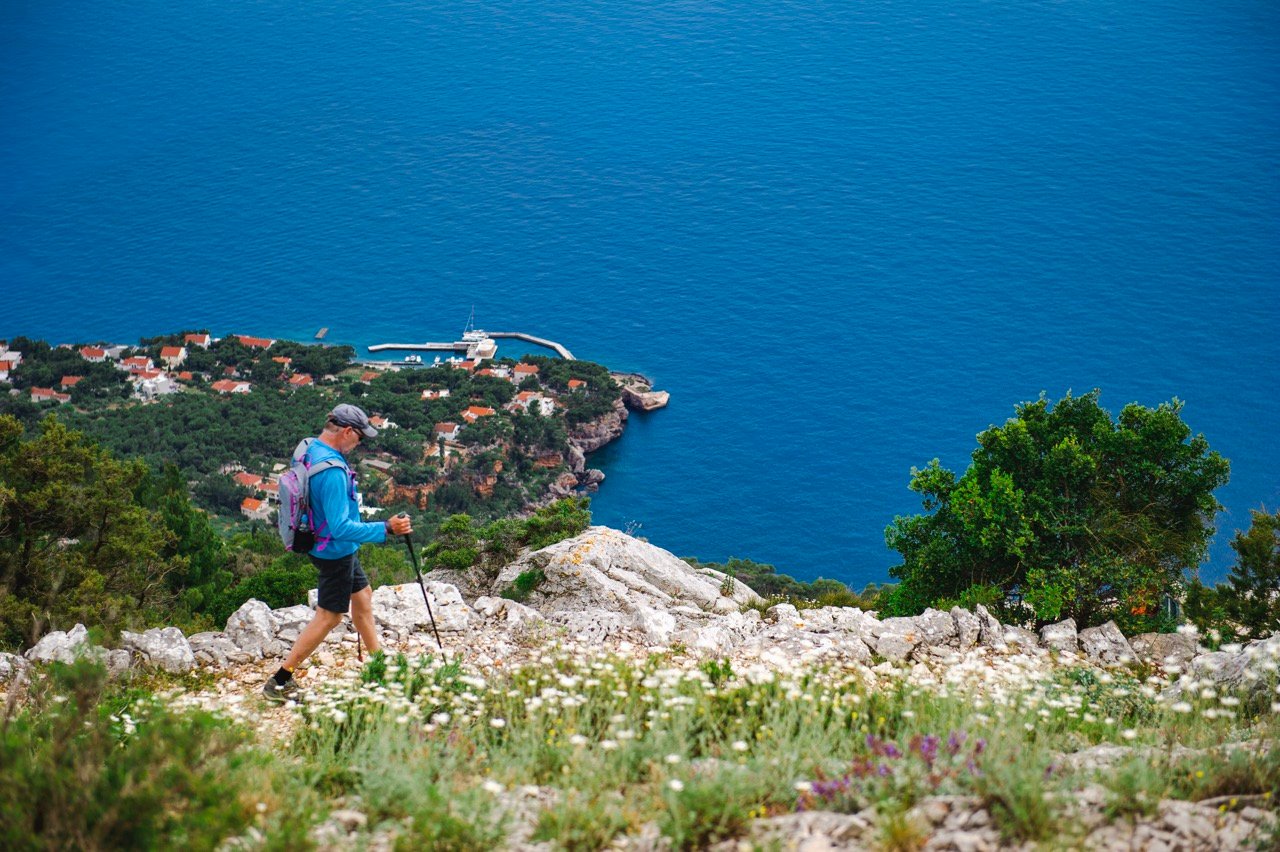 Hiker walking through Dalmatian backcountry