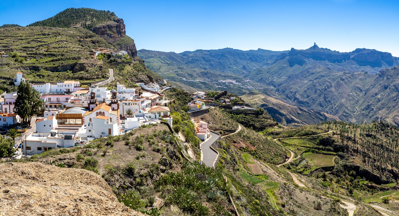 The hilltop village in Gran Canaria, Artenara, located close to the GR131 trail with typical white houses and a church.
