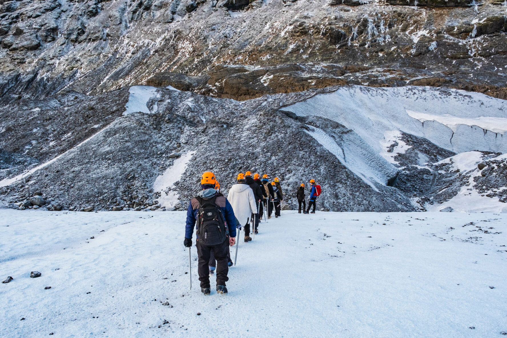 Hikers on ice walking