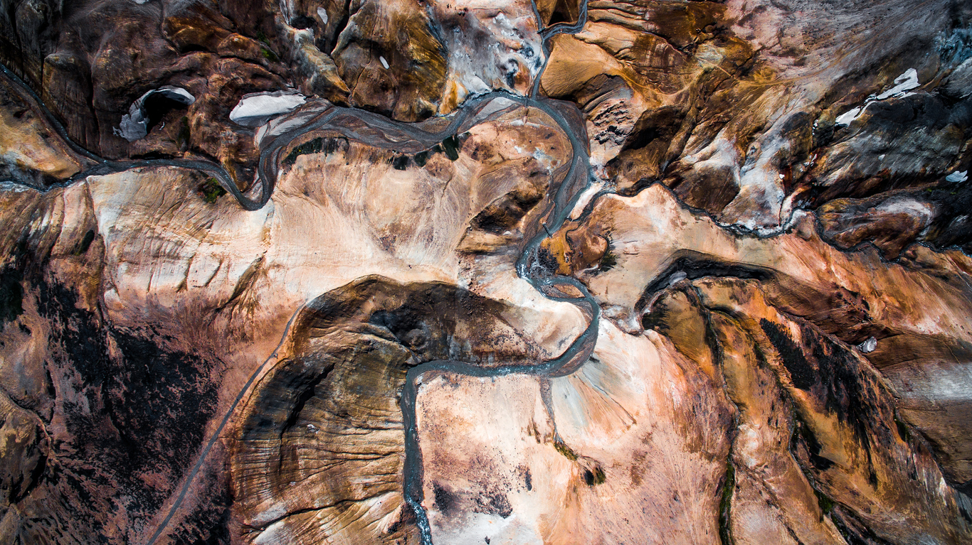 Drone aerial view of Kerlingarfjoll, Geothermal Area highland of Iceland, Europe. Interesting snow,river and mountain patterns