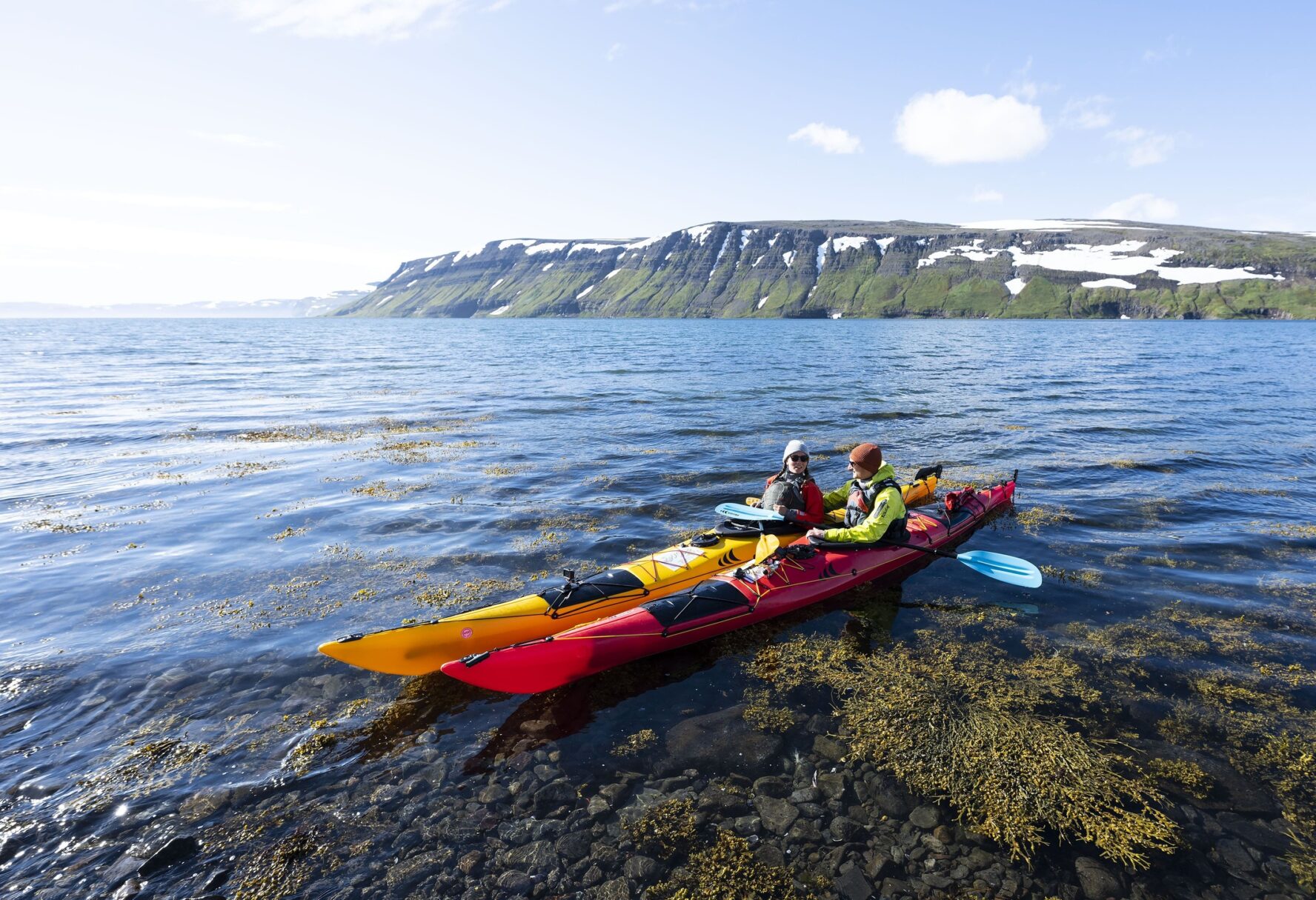 Two kayakers talking in Iceland