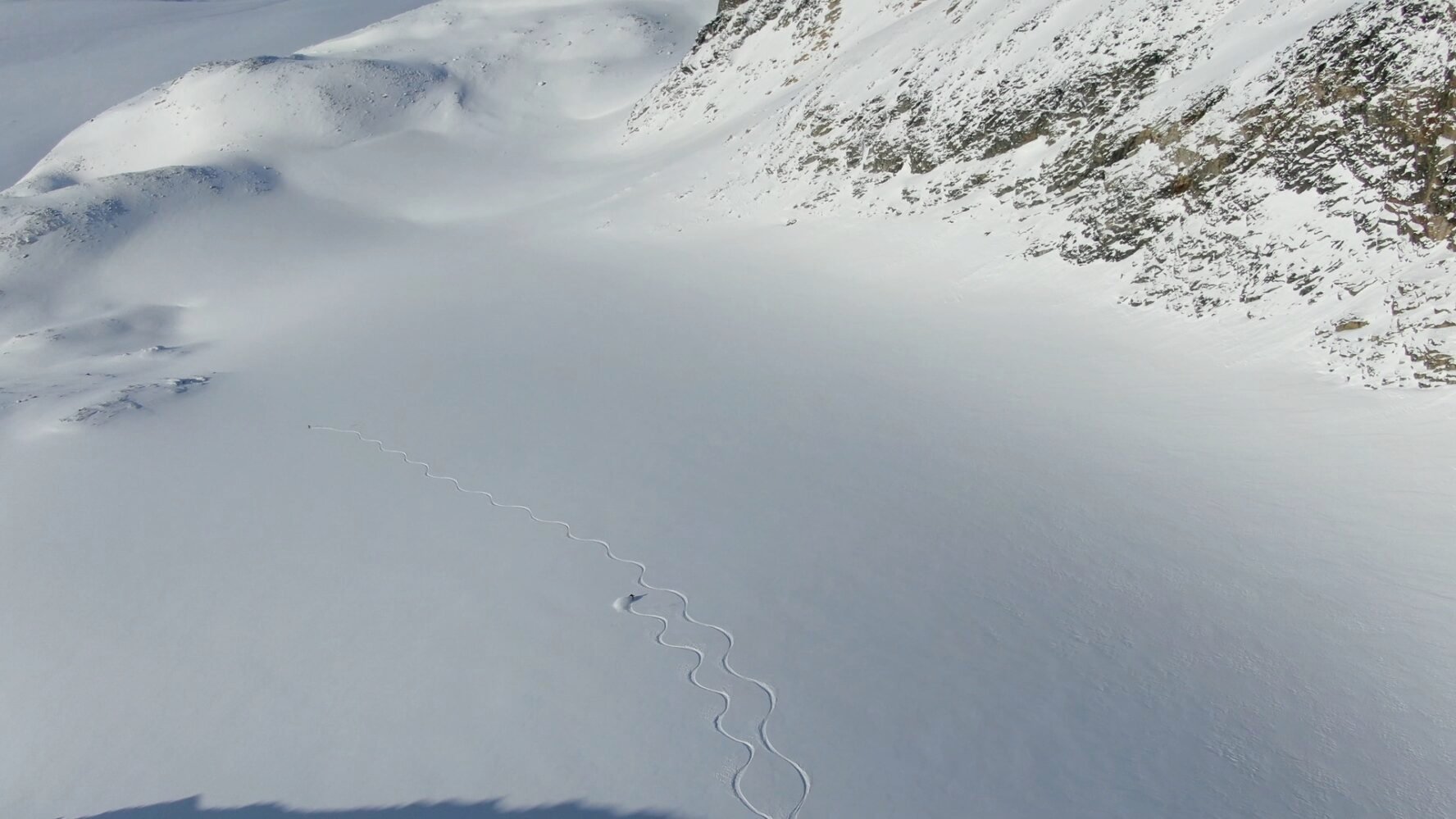 Bird view of a skier in Greenland