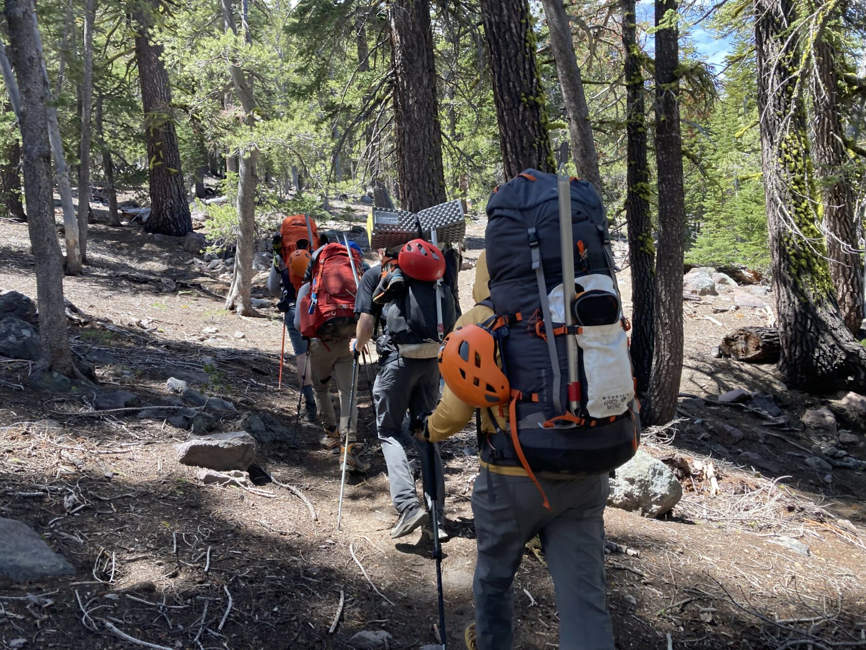 Climbers and backpacks on Dhadta