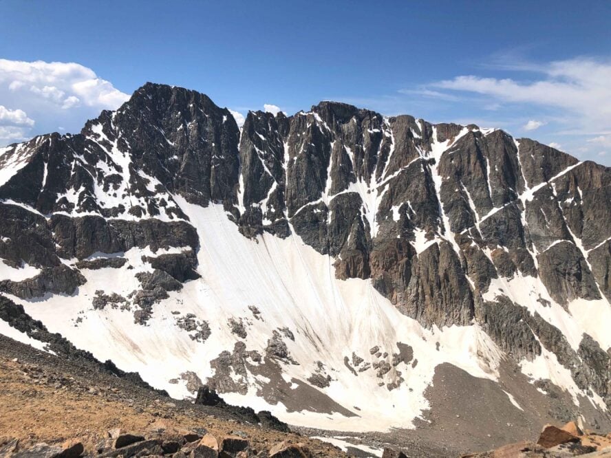 Granite Peak’s northeast face in summer, with prominent snow slopes.