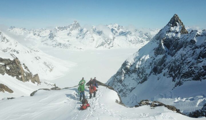 A group skiing in Greenland