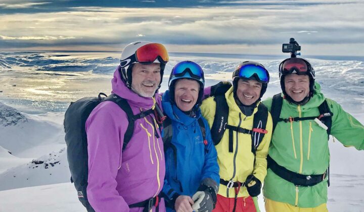 Happy group skiing in Greenland