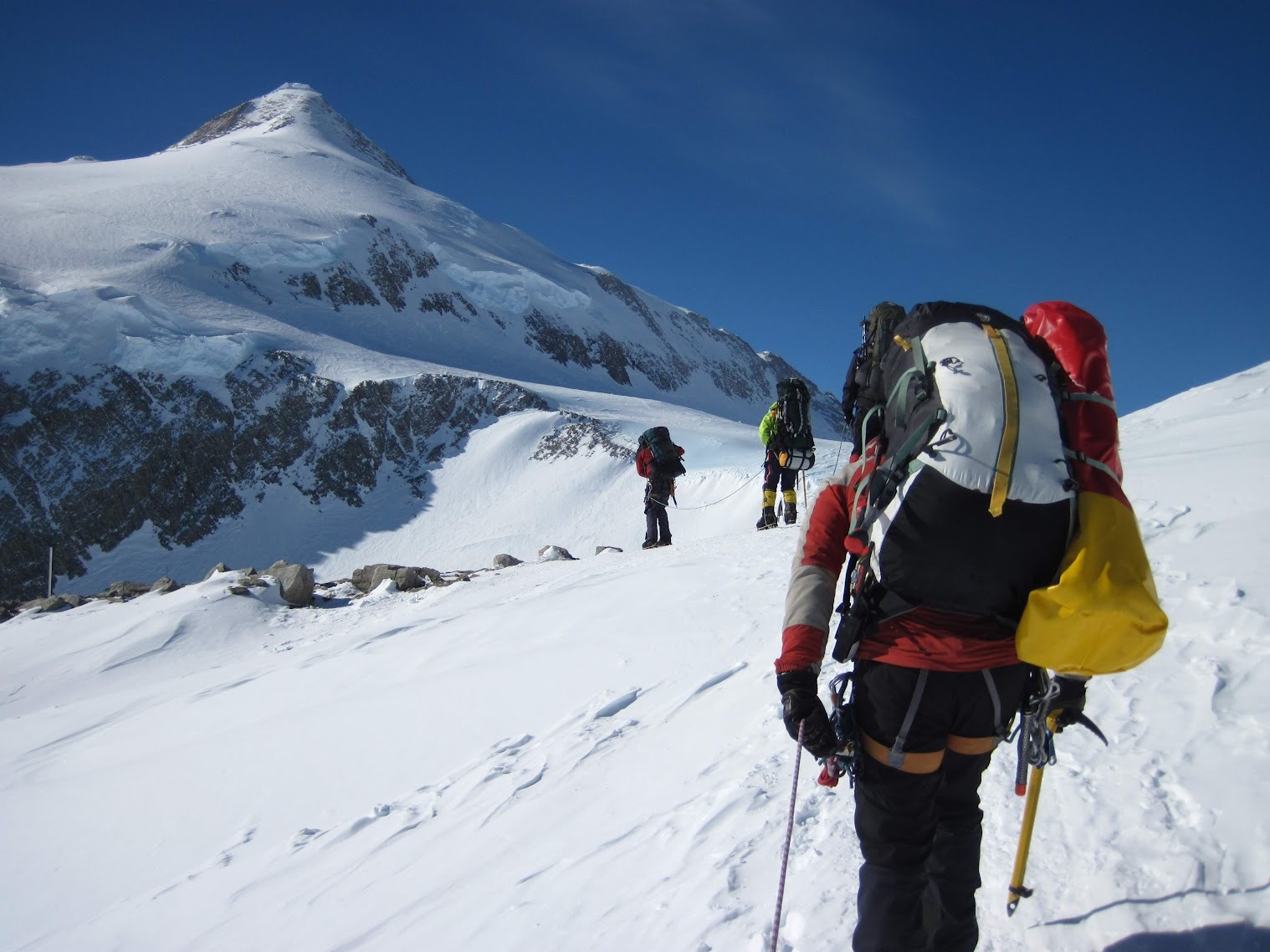 Mountaineers carrying some of their equipment to another camp while climbing Mt Vinson.