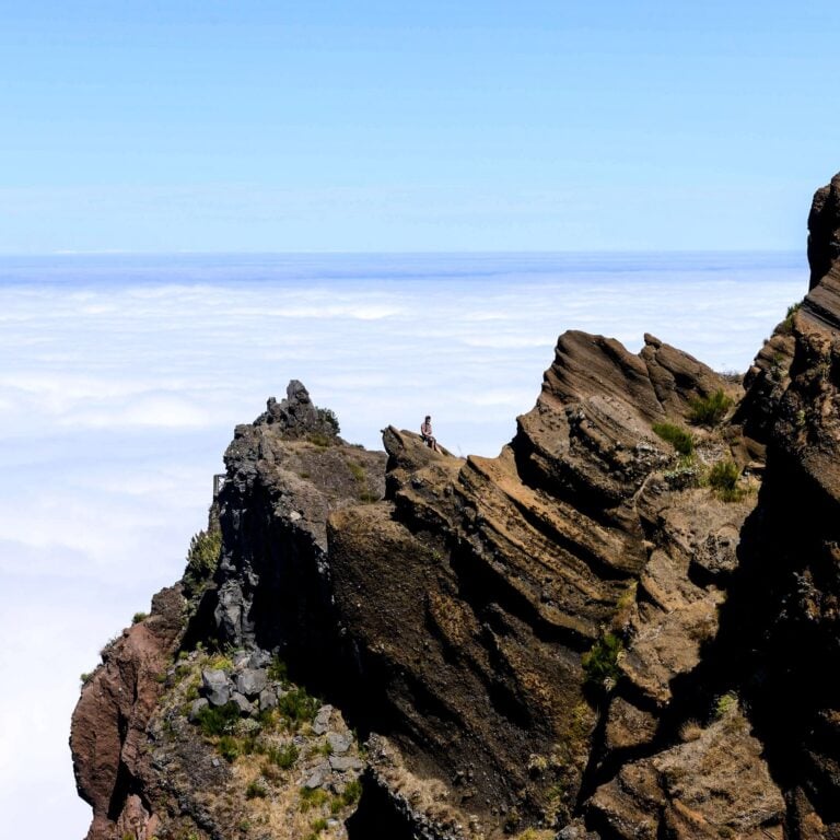 Hiker Madeira above clouds