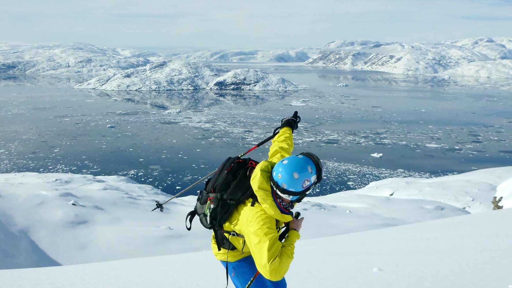 Skier in Greenland next to sea