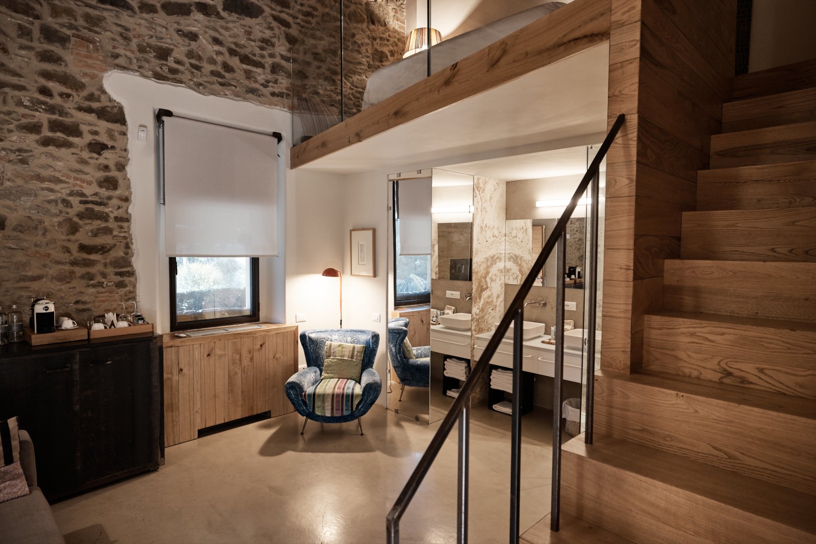 The interior of a villa in Tuscany, part of an agriturismo, combining rustic details and elegance.