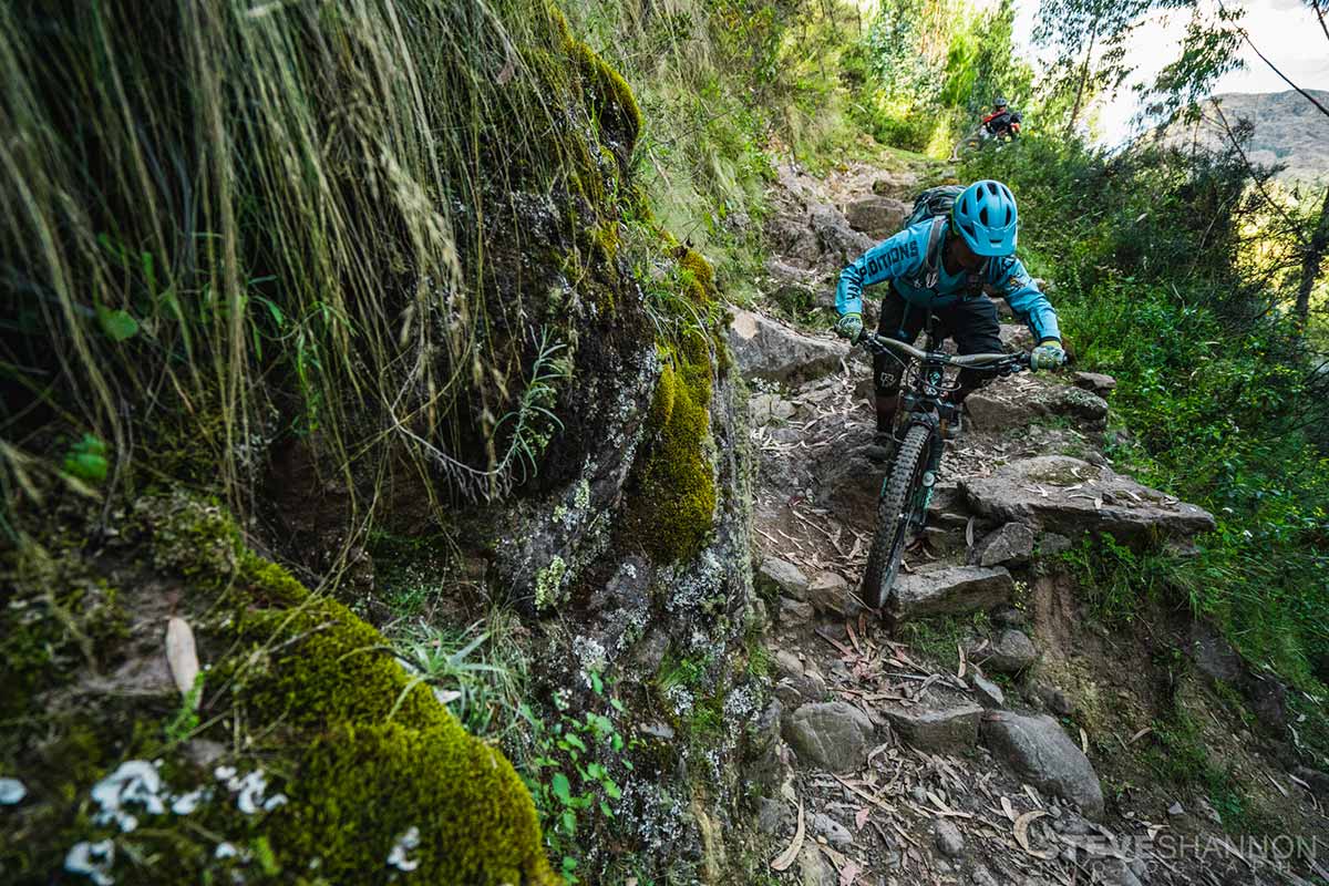 A MTB rider shredding through gnar of Lamay