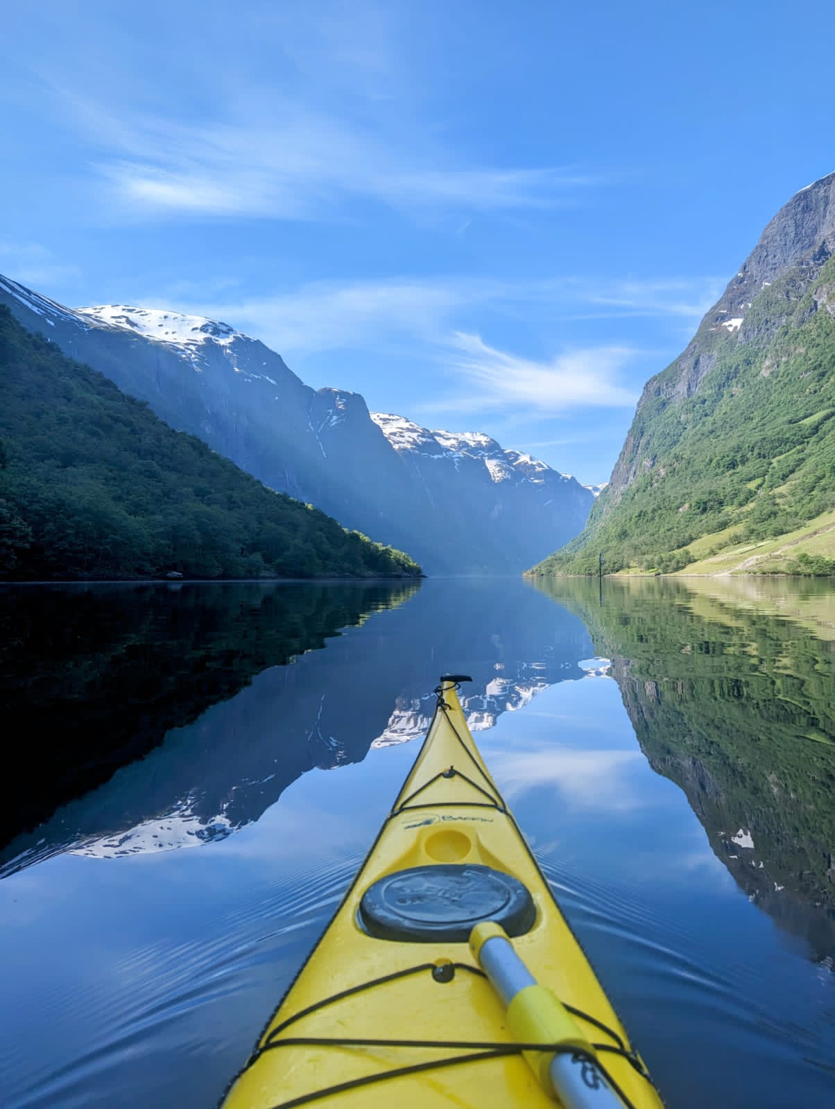 The tip of a kayak heading to the next camping spot