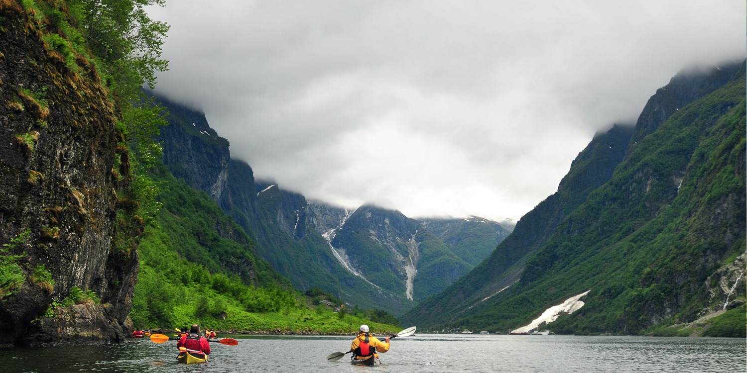 Mist-clad mountains during a stage of kayaking