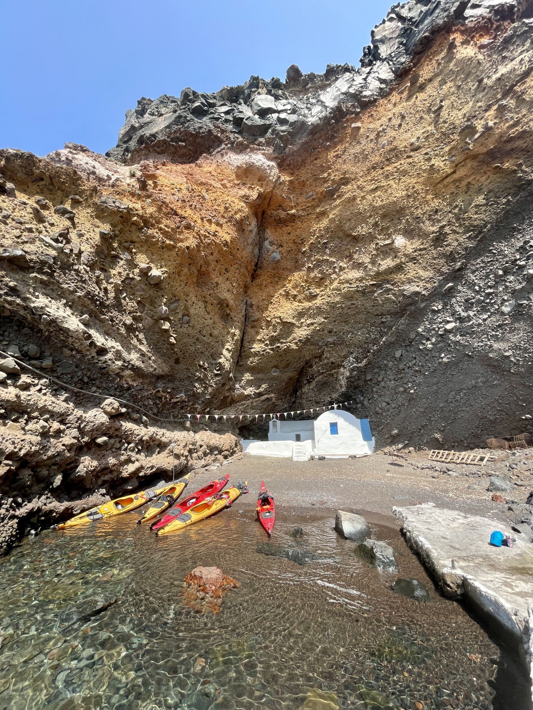 Kayaks on a beach in Santorini