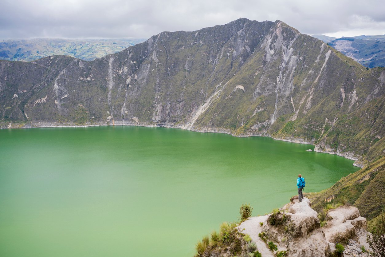 The emerald green crater lake at the top of the Quilotoa Volcano, Ecuador.
