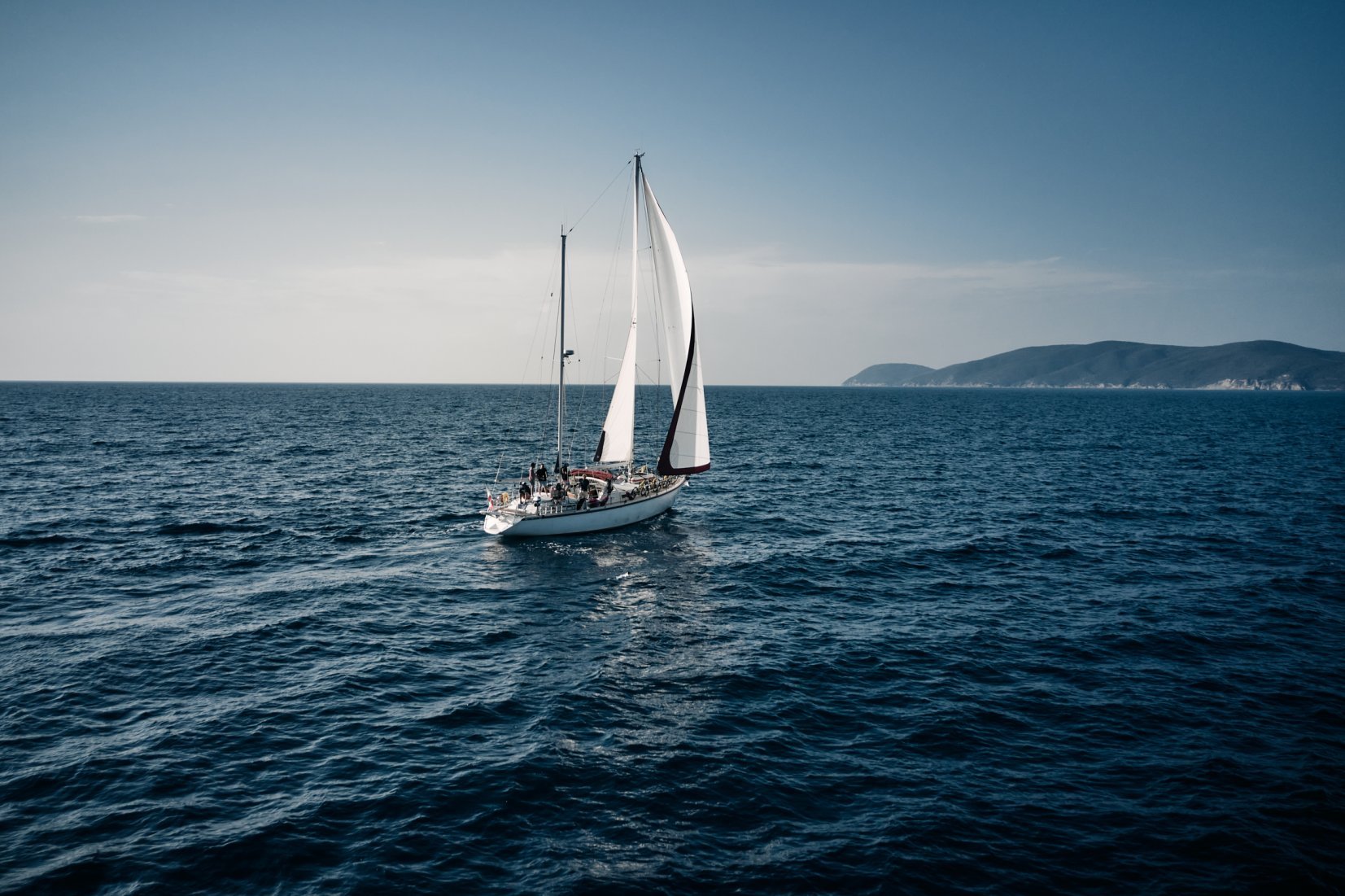 A sailboat heading to the island of Elba in the Tyrrhenian Sea.