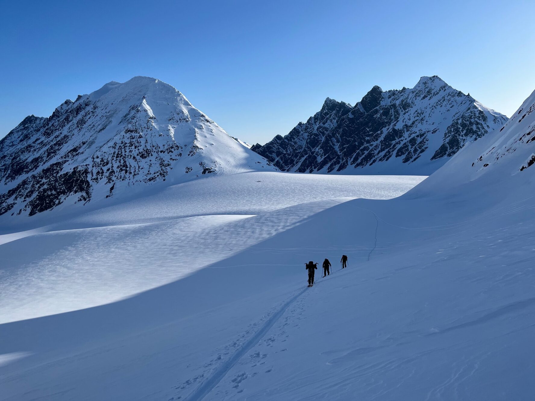 Three skiers in Alaska