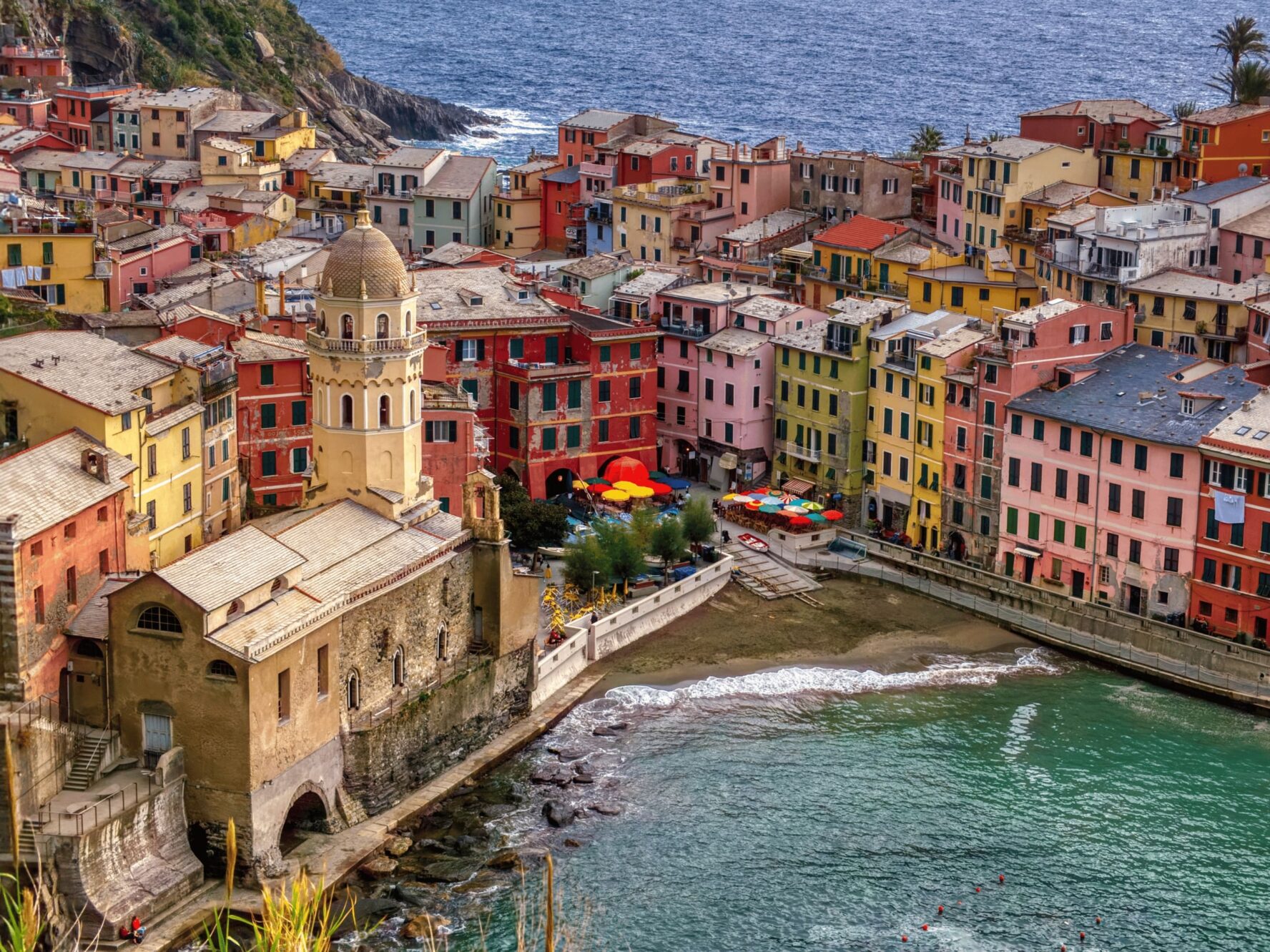Aerial view of the houses and beach of Vernazza