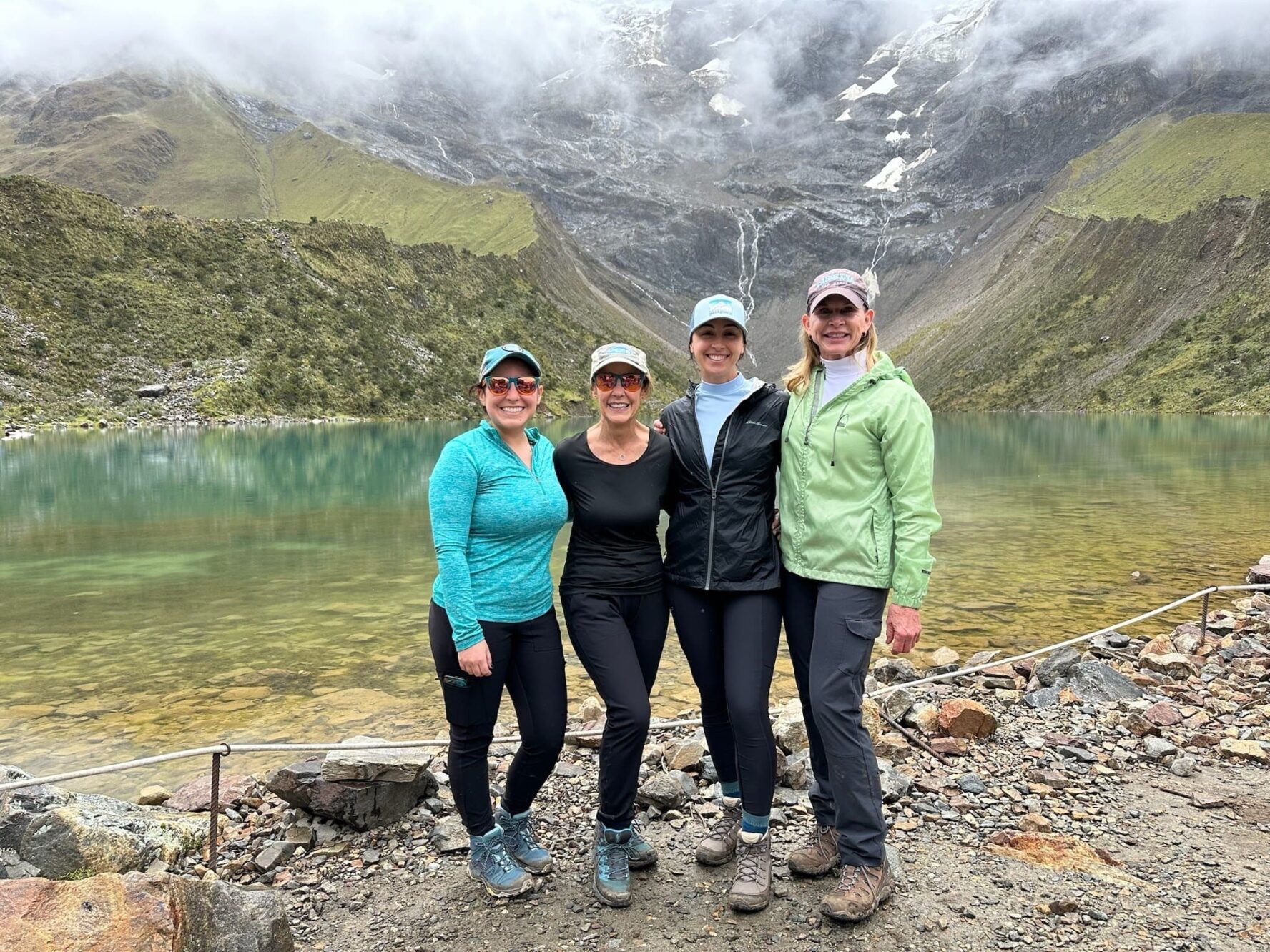 Four women lake in Peru