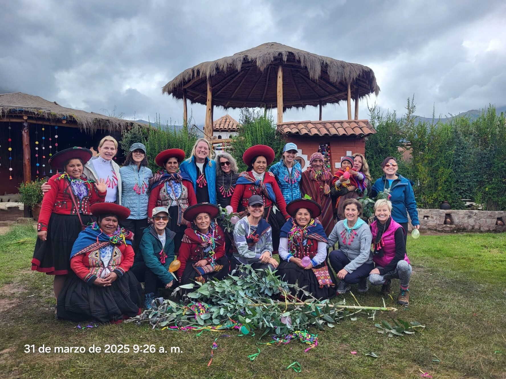 Happy group hikers and local women