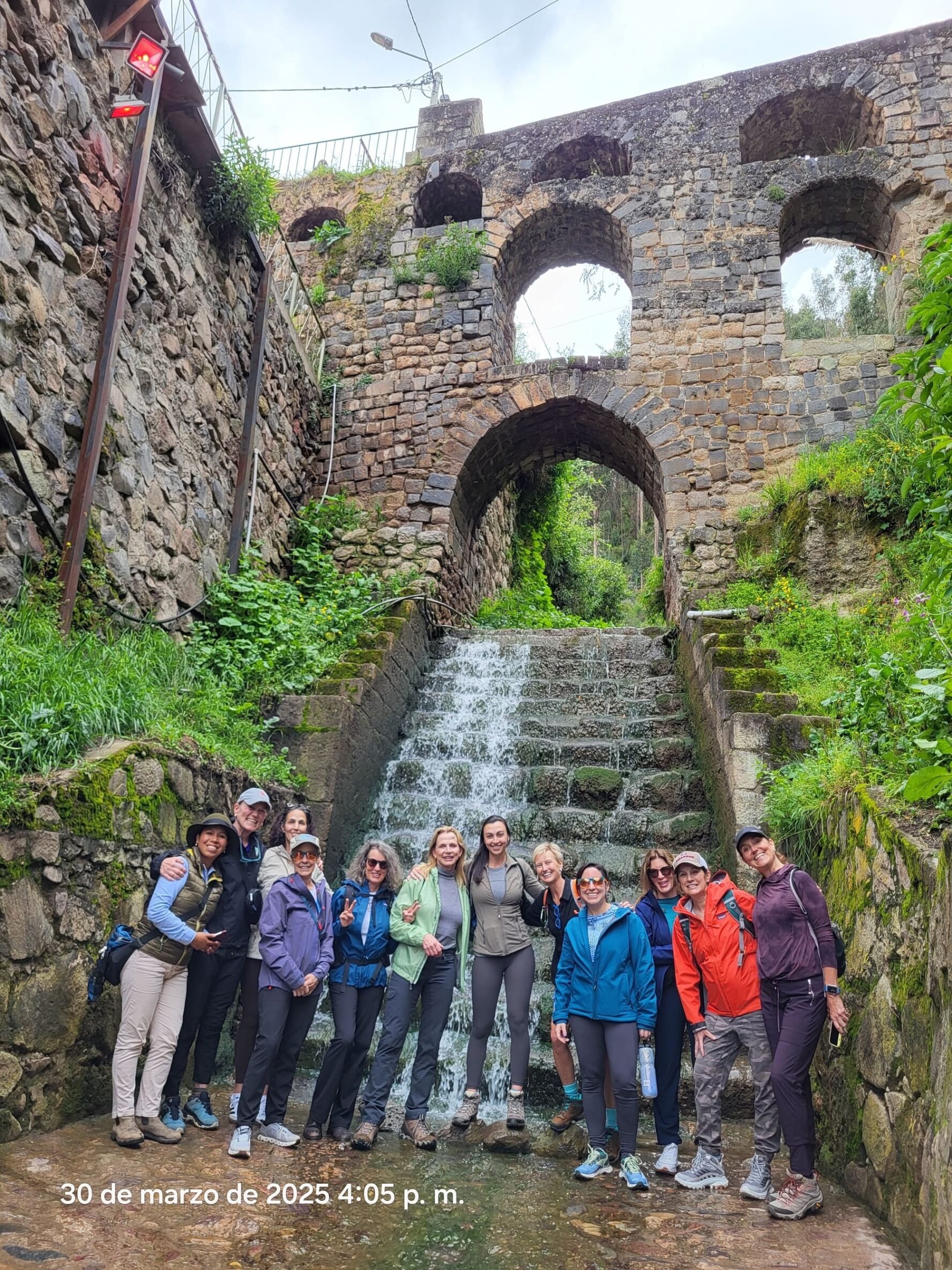Happy women waterfall in Peru