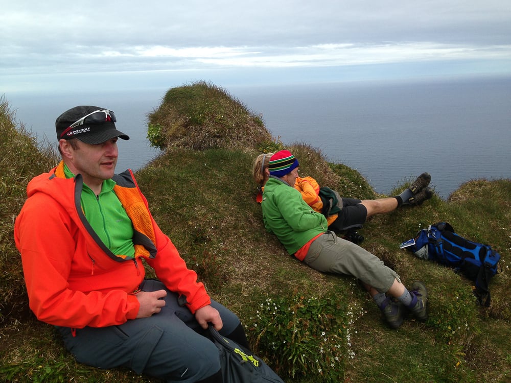 Hikers taking a break from walking in Hornstrandir, Westfjords.