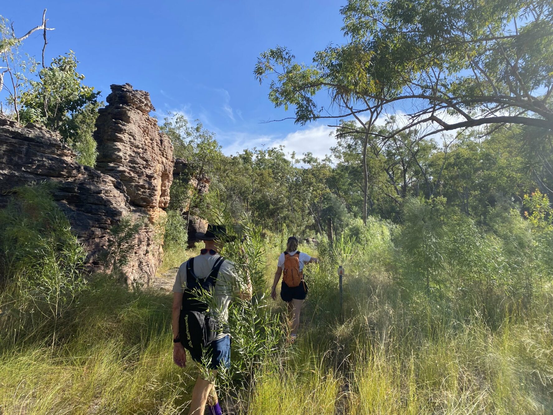 Two hikers in the wilderness area of Australia’s Top End region.