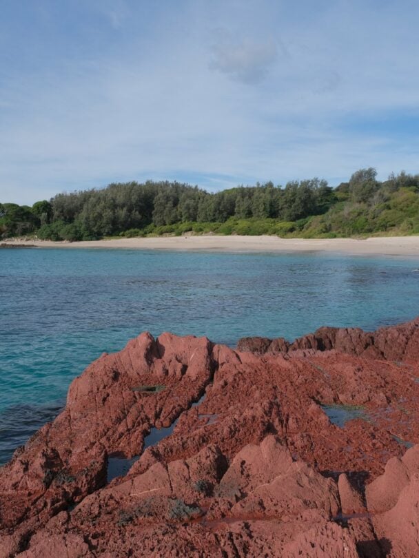 Hikers tackling the reggae shoreline in Beowa NP.