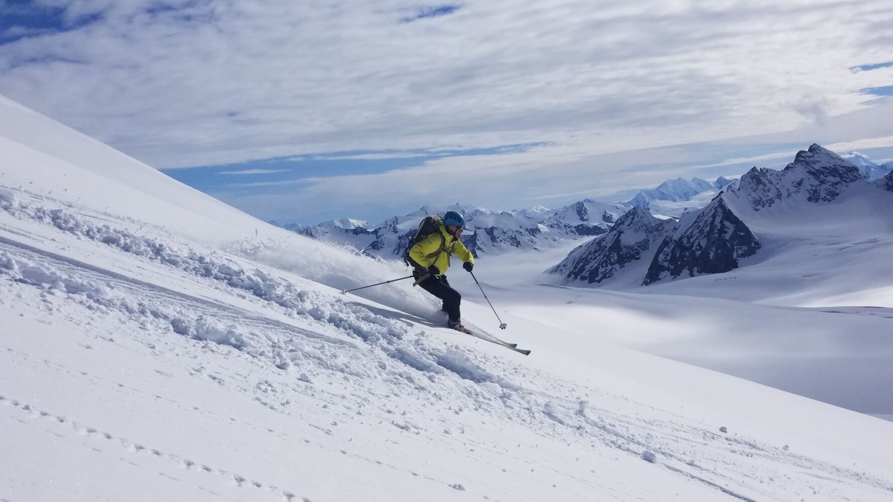 Skier going downhill in Chugach