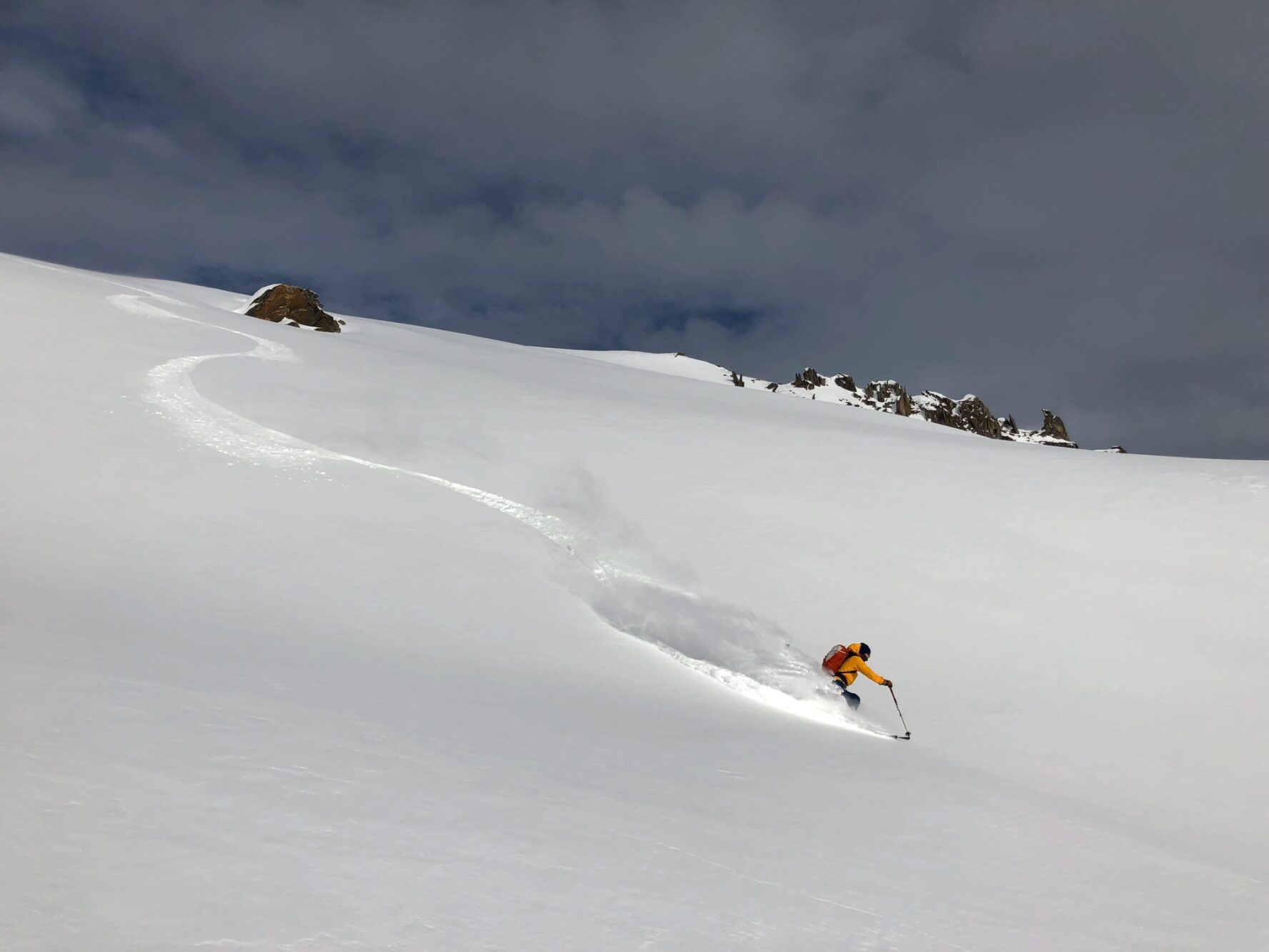 Skier freeriding in the Swiss Alps
