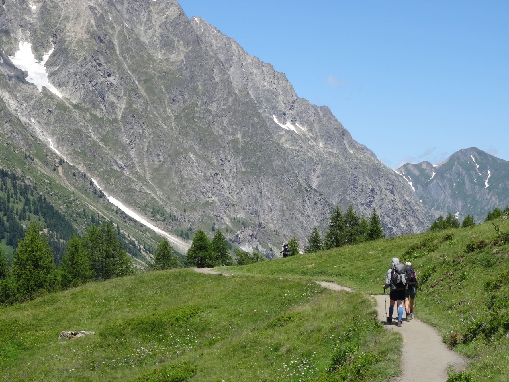 Steep mountain and hikers